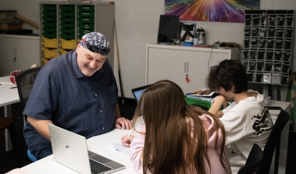 A Youth Futures Teacher in the classroom with young people.